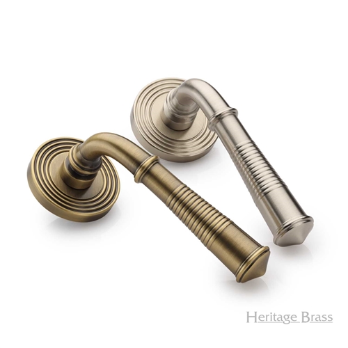 Bridgetown Reeded Door Handle on Round Rose in Antique Brass