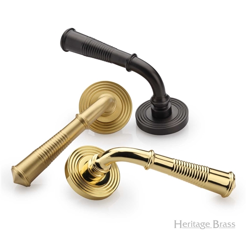 Bridgetown Reeded Door Handle on Round Rose in Antique Brass