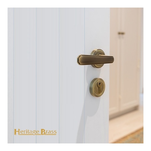 Century Door Handle on Round Rose in Satin Brass