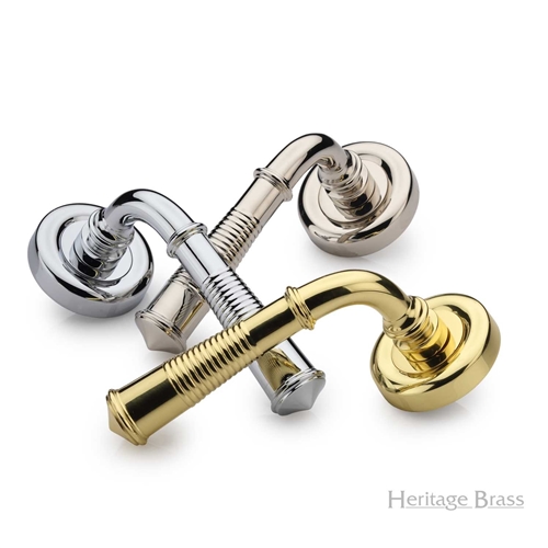 Colonial Reeded Door Handle on Round Rose in Antique Brass