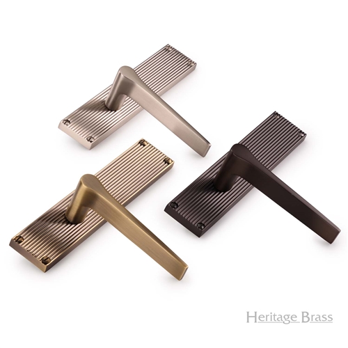 Gio Reeded Door Handle on Plate in Antique Brass