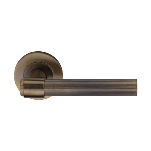 Heritage Brass Linear Fountain Lever on Rose in Antique Brass