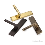 Atlantis Long Door Handle on Plate in Antique Brass