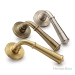 Bridgetown Reeded Door Handle on Round Rose in Antique Brass