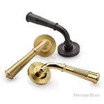Bridgetown Reeded Door Handle on Round Rose in Antique Brass