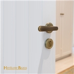 Century Door Handle on Round Rose in Satin Brass