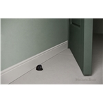 Round Shielded Floor Mounted Door Stop  in Antique Brass
