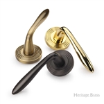 Sutton Reeded Door Handle on Round Rose in Satin Brass