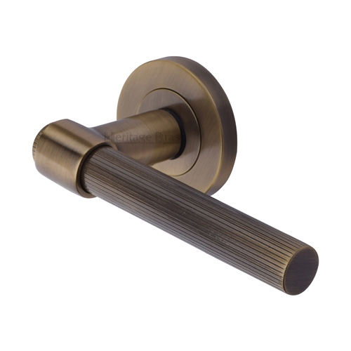 Heritage Brass Linear Fountain Lever on Rose in Antique Brass