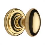 Chelsea Door Knob on Rose in Polished Brass