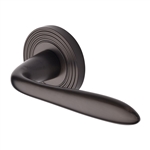 Sutton Reeded Door Handle on Round Rose in Matt Bronze
