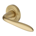 Sutton Reeded Door Handle on Round Rose in Satin Brass