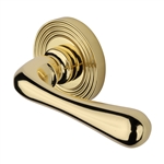 Charlbury Reeded Door Handle on Round Rose in Polished Brass