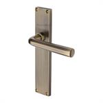 Octave Reeded Door Handle on Plate in Antique Brass