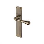 Roma Reeded Door Handle on Plate in Antique Brass