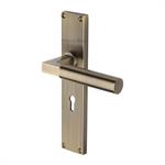Bauhaus Reeded Door Handle on Plate in Antique Brass
