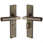 Bauhaus Reeded Door Handle on Plate in Antique Brass