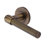 Heritage Brass Knurled Fountain Lever on Rose in Antique Brass
