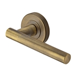 Shuttle Door Handle on Round Rose in Antique on Zinc