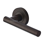 Shuttle Door Handle on Round Rose in Matt Bronze on Zinc