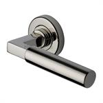 Bauhaus Door Handle on Round Rose in Polished Nickel Finish