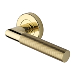 Bauhaus Mitre Knurled Door Handle on Round Rose in Polished Brass