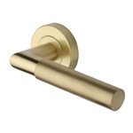 Bauhaus Mitre Knurled Door Handle on Round Rose in Satin Brass