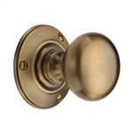 Chester  Mortice Knob on Rose in Antique Brass