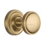 Whitehall Door Knob on Rose in Satin Brass