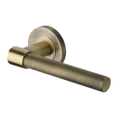 Phoenix Knurled Door Handle on Round Rose